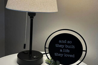 Lamp on table with sign